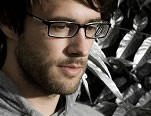 Will Saul face picture with glases.