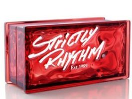 Strictly Rhythm logo on a red brick